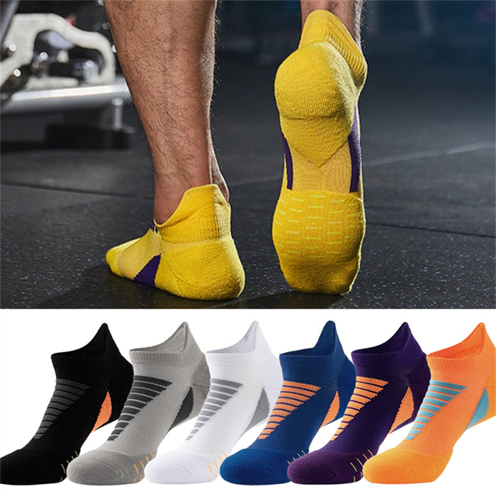 Yellow sports socks on foot and colorful sports socks collection in white, blue, purple, and black with vibrant design accents