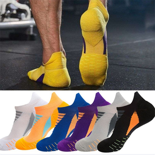 Yellow sports socks on foot and colorful sports socks collection in white, blue, purple, and black with vibrant design accents