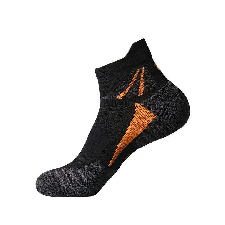 A single black ankle sock with orange stripes on a white background.