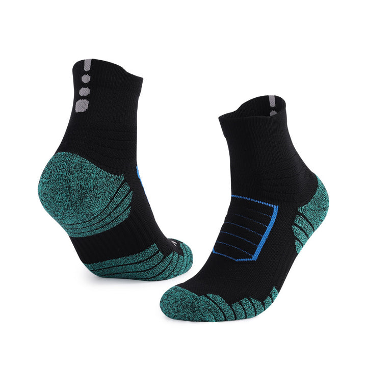 Black and green cushioned sports socks with arch support, designed for enhanced comfort and performance.