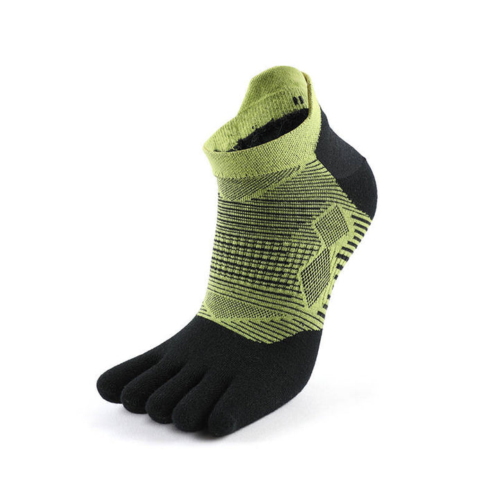 Black toe sock with green pattern and ankle cuff on a white background.