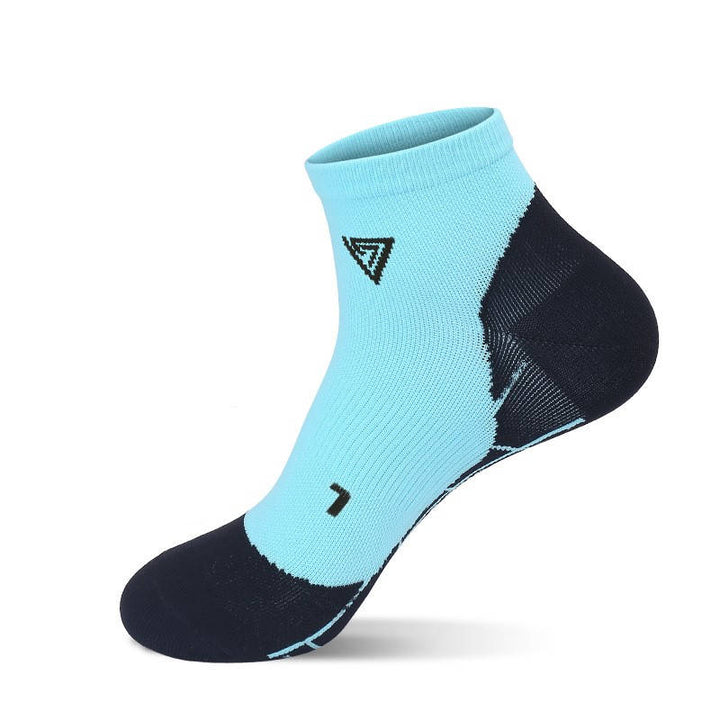 A single blue ankle sock with a white geometric pattern design.