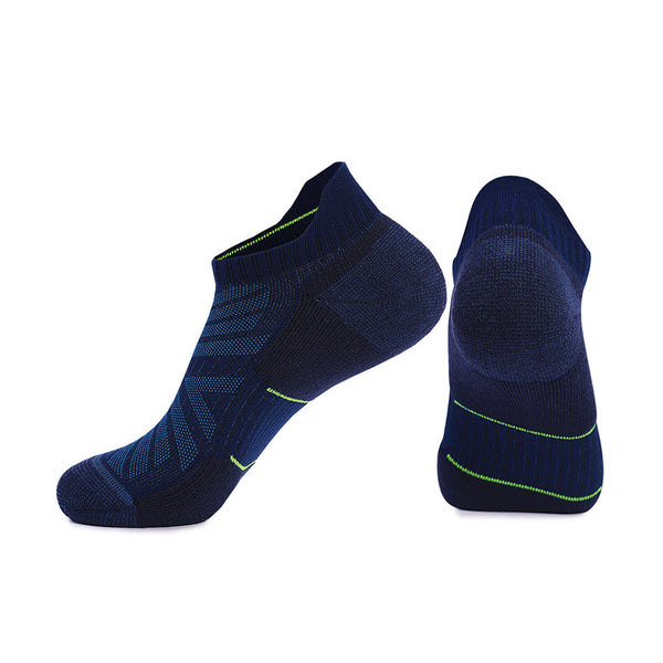 Pair of dark blue sports socks with green accent lines isolated on a white background.