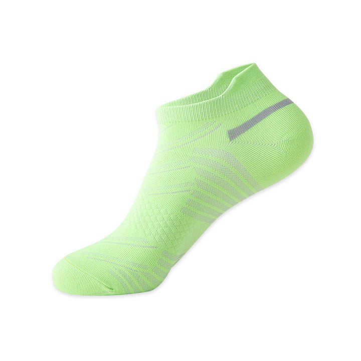 Neon green ankle sock with breathable mesh zones and dark green accent.