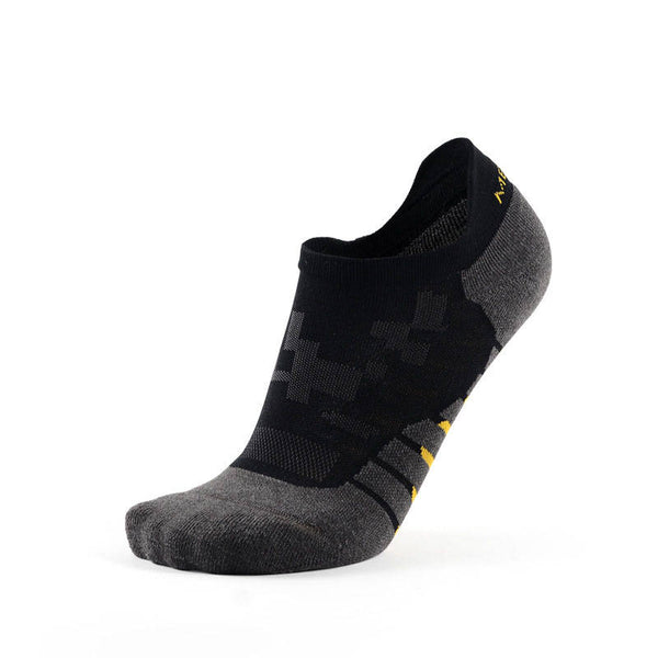 A black and gray patterned ankle sock with yellow accents on a white background.