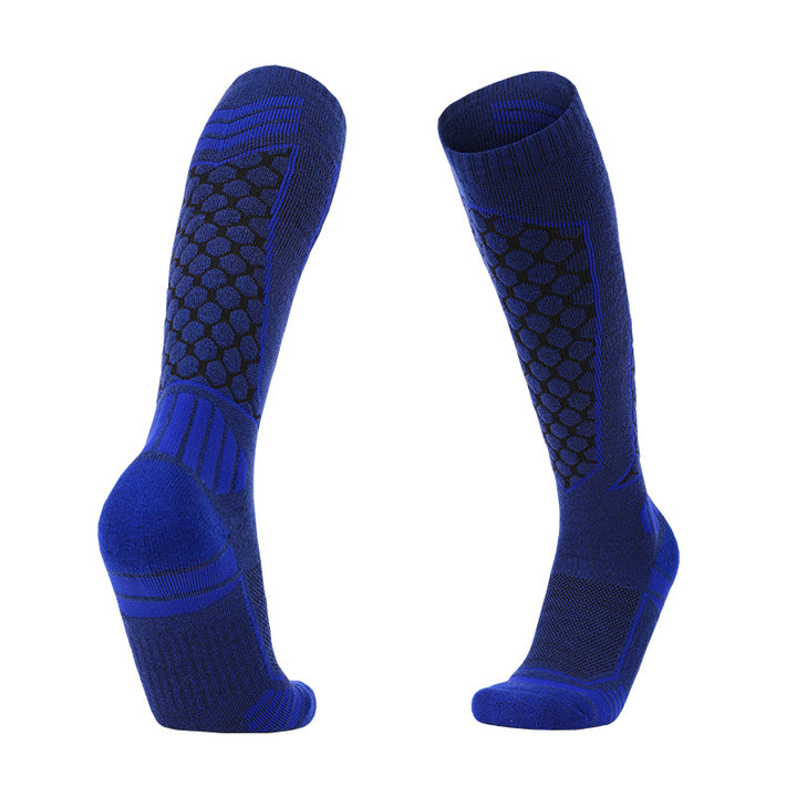 Thick padded merino wool skiing over-the-calf socks in blue for warmth and comfort.