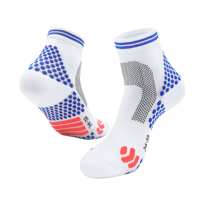 White athletic ankle socks with blue grip patterns, red arch support, and a non-slip red logo on the sole.