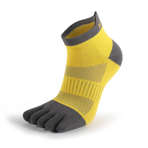 Yellow tabi sports ankle socks with gray accents isolated on white background.